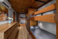 Bunk Bed in Female Dormitory Room with Curtain
