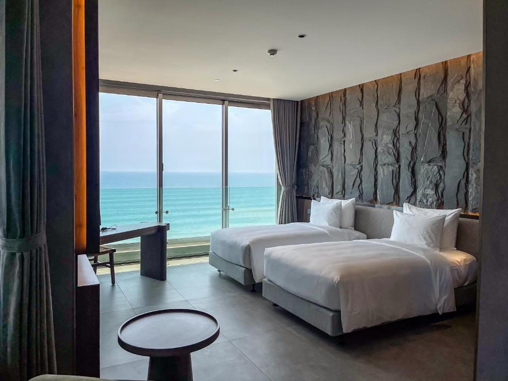 Phòng Deluxe 2 Giường Đơn Nhìn Ra Biển Có Bồn Tắm – Bao Gồm Trà Chiều Hằng Ngày