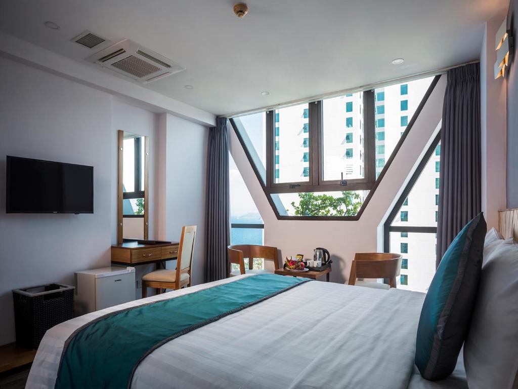 Phòng Giường Đôi/2 Giường Đơn Nhìn Ra Góc Biển