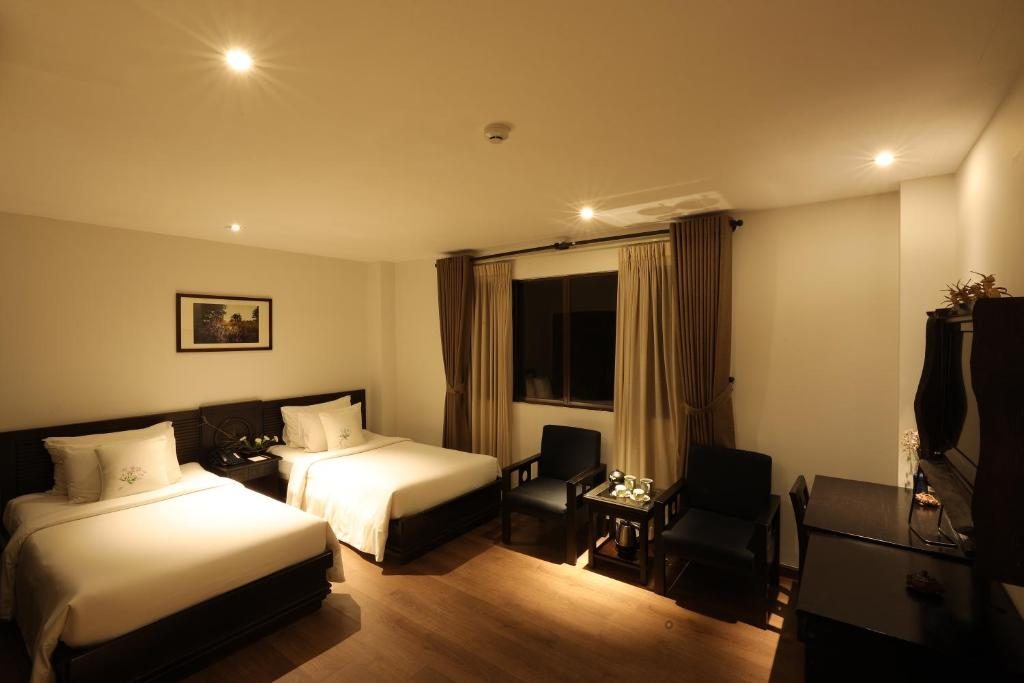 Phòng Premier 2 Giường Đơn có minibar miễn phí