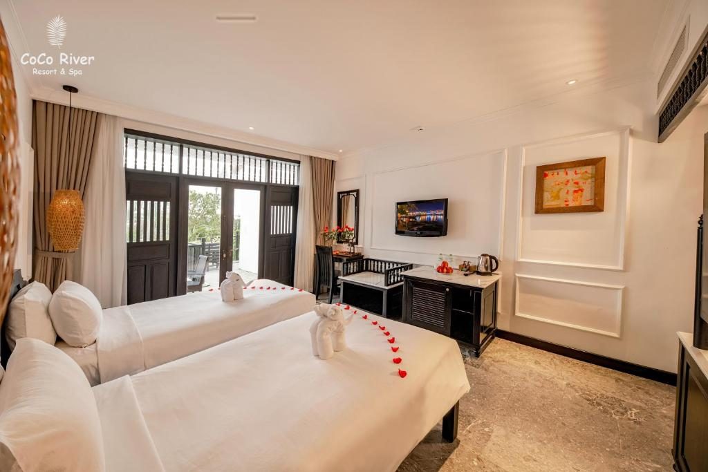 Phòng Deluxe 2 Giường Đơn Nhìn Ra Hồ Bơi