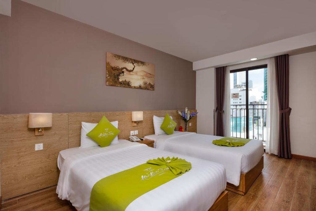 Deluxe Double or Twin Room with Balcony and City View