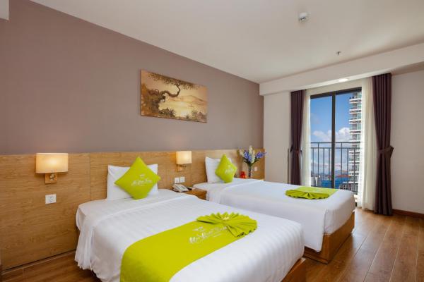 Deluxe Double or Twin Room with Balcony and City View