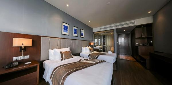 Deluxe Room with Partial Sea View – Sauna access & Stay More, Pay Less