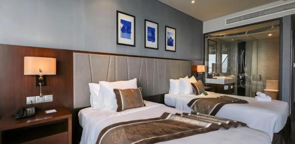 Deluxe Room with Partial Sea View – Sauna access & Stay More, Pay Less