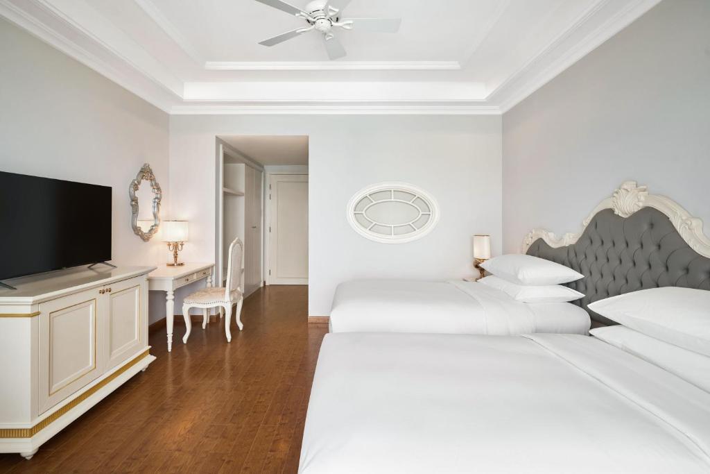 Phòng Deluxe 2 Giường Đơn Có Ban Công Nhìn Ra Vườn