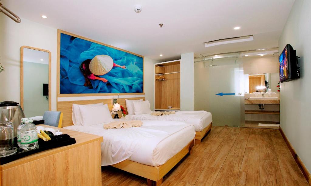 Phòng Deluxe (2 Người lớn + 1 Trẻ em)