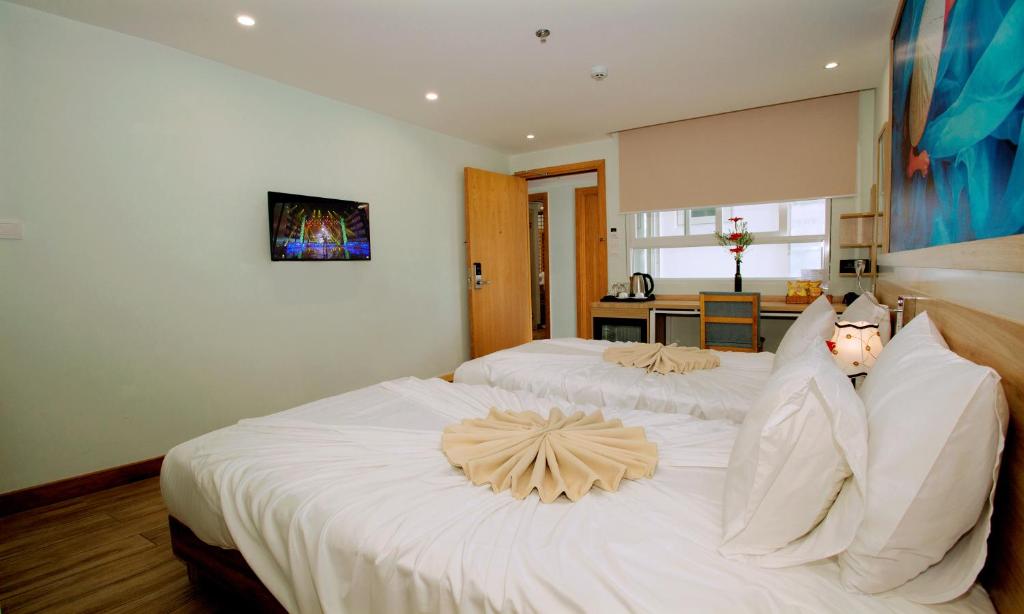 Phòng Deluxe (2 Người lớn + 1 Trẻ em)