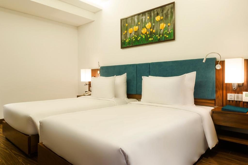 Phòng Deluxe 2 Giường Đơn Nhìn ra Một góc Biển