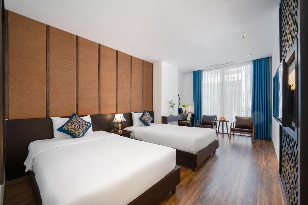 Phòng Deluxe 2 giường đơn với ban công