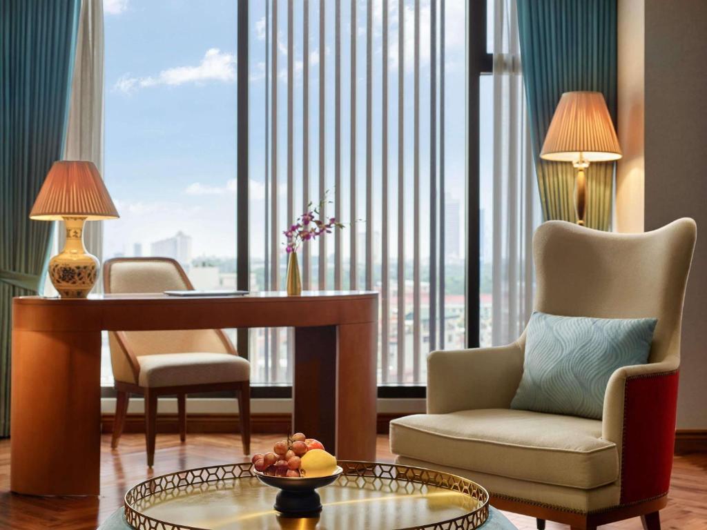 Suite Deluxe có Giường cỡ King với Quyền lui tới Sảnh khách