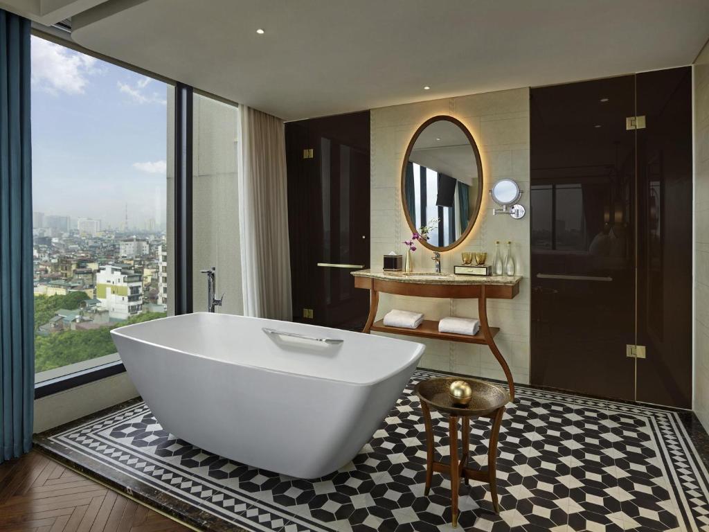 Suite Deluxe có Giường cỡ King với Quyền lui tới Sảnh khách