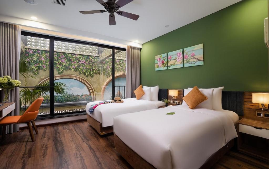 Phòng Deluxe 2 Giường Đơn Nhìn Ra Hồ Bơi