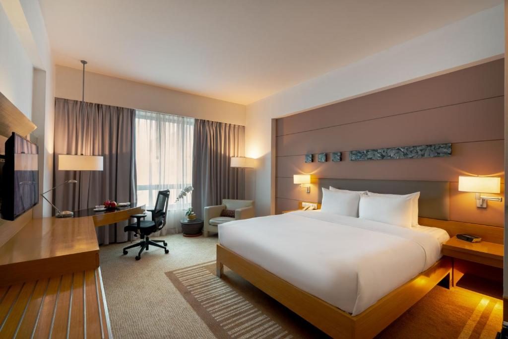 Orchid Deluxe with Free Airport Transfers, 4 Pieces of Laundry Daily and Evening Cocktail