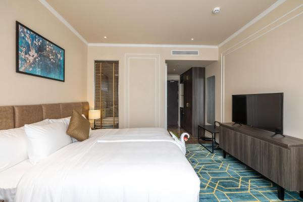 Phòng Deluxe Giường Đôi + Xe Đưa Đón Miễn Phí Đến Trung Tâm Thành Phố