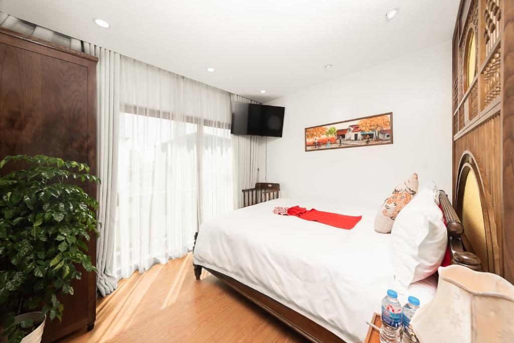 Phòng Deluxe Giường Đôi Có Ban Công