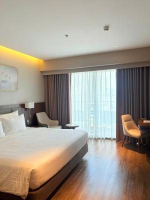 Phòng Deluxe Đôi hoặc 2 giường đơn nhìn ra 1 góc biển